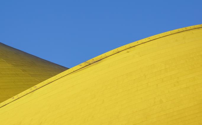 blue sky and yellow buildings