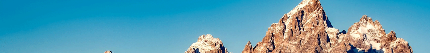 Mountains with blue sky in background