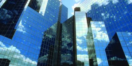 Buildings reflecting sky