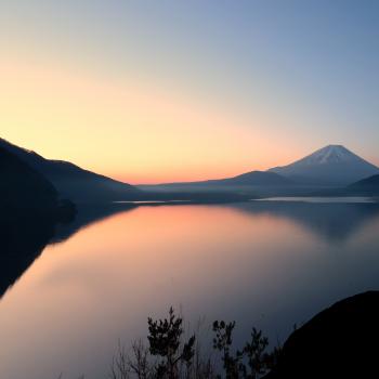 Lake with Mountains and Climbers