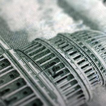 Capital building on dollar bill