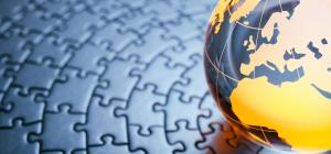 Globe on puzzle pieces